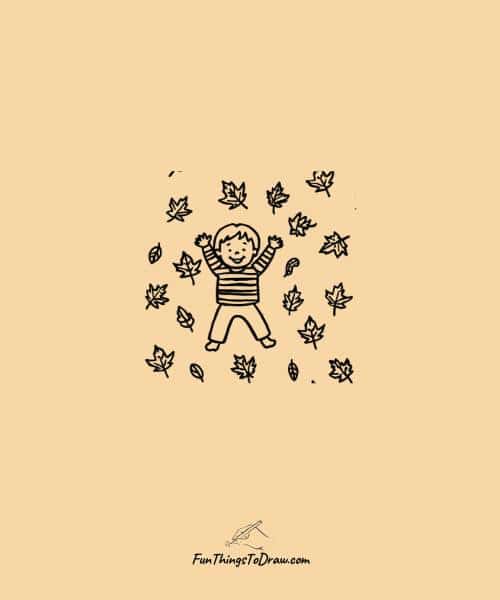 Kid playing in leaves drawing