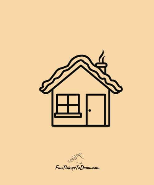 Small house with snow on the roof