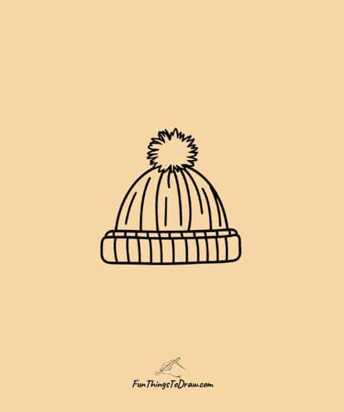 Woolen hat with a pom-pom