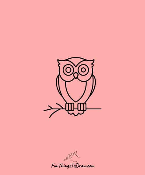 An owl perched on snowy branch