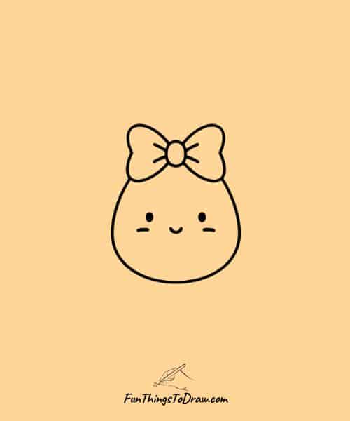 egg wearing bow