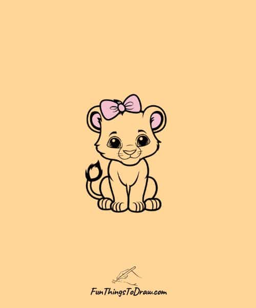 lion cub wearing bow
