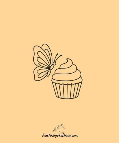 Drawing of butterfly with a cupcake