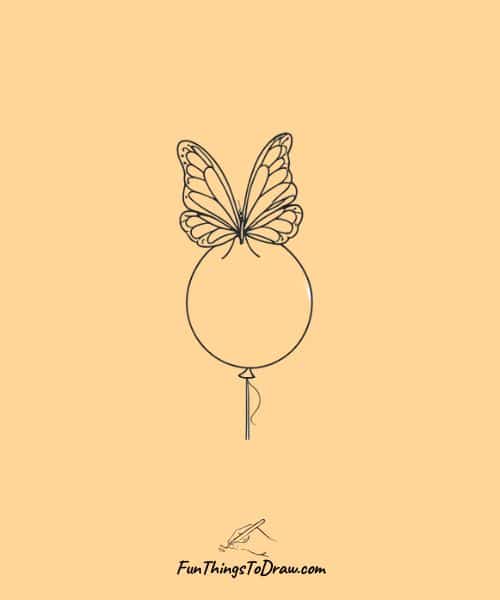 Drawing of butterfly with balloon