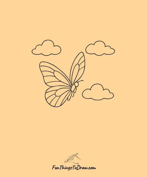 Drawing of butterfly with clouds around