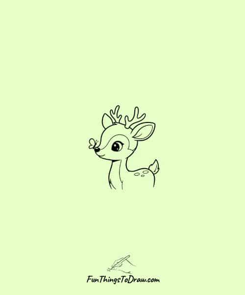 Deer with a butterfly on its nose